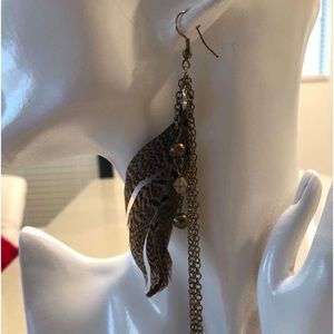 Soho hearts Long copper colored feather earrings